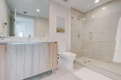 a bathroom with a sink and a toilet and a shower at 3900-902CH DESIGN DISTRICT, CONDO 2 BEDROOMS & 2 BATHROOMS in Miami