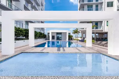 an image of a swimming pool in a building at 3900-902CH DESIGN DISTRICT, CONDO 2 BEDROOMS & 2 BATHROOMS in Miami