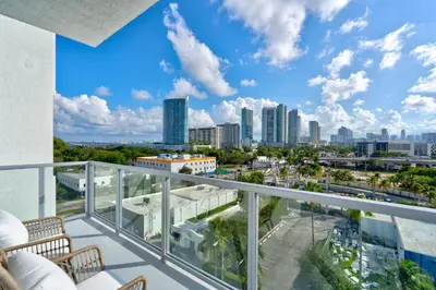 a balcony with a view of the city at 3900-602LG DESIGN DISTRICT, CONDO 2 BEDROOMS & 2 BATHROOMS in Miami