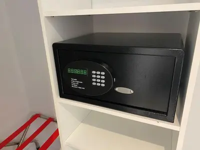 a microwave oven in a shelf in a kitchen at Modern Apt by the Beach, Full Kitchen -A in Hallandale Beach