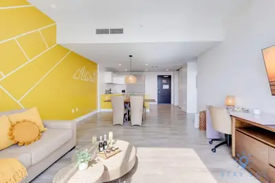 a living room with a couch and a table at Lovely Apt for 6 - Hollywood Beach Broad - walk in Hollywood