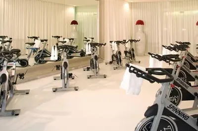 a room with a bunch of exercise bikes in it at Water & Pool Views, One bedroom W hotel building in Miami