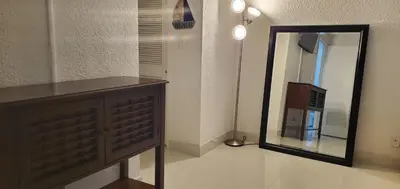 a bathroom with a mirror and a dresser in a room at SIAN private Apartments in Hollywood