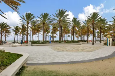 a park with palm trees on the beach at Studio Right off Las Olas - Steps to FTL Beach 2C in Fort Lauderdale