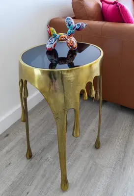 a gold table with a glass top on a couch at Oceanside Penthouse Apartment in Brickell Miami, Pool, Free Parking in Miami