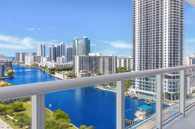 a view of a river in a city with tall buildings at Condo Retreat with Stunning Views and Amazing Pools in Hallandale Beach