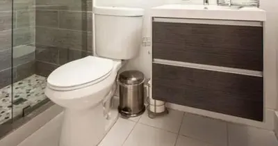 a bathroom with a toilet and a sink and a shower at Luxurious Retreat with Tennis and Soccer Courts TGH in Miami