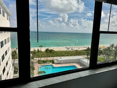 a view of the ocean from a hotel window at Directly on the Beach with Pool & Ocean View in Miami Beach