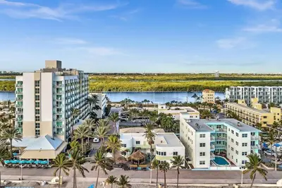 an aerial view of a city with palm trees and buildings at Panoramic beachfront Suite in Hollywood