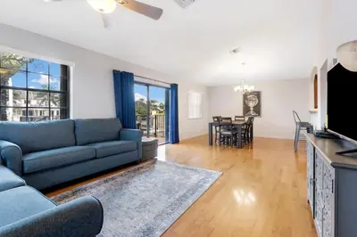 a living room with a couch and a dining room at DOWNTOWN LAS OLAS WATERFRONT HOME UPDATED UNIT in Fort Lauderdale