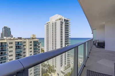 a balcony with a view of the ocean and buildings at Luxury 2BR 2BA Water Front in Hyde Beach Resort in Hollywood