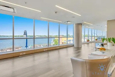 a large office with a view of the water at Best Stay Rooftop Pool Hollywood Beach Boardwalk in Hollywood