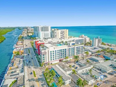 an aerial view of a city and the ocean at The Most Liked Homes Hot tub & Unique Rooftop in Hollywood