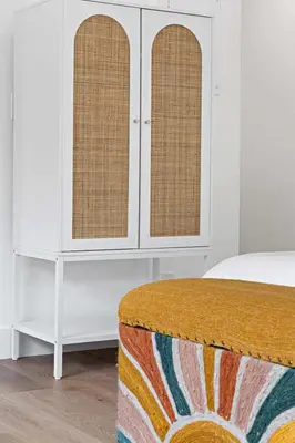 a white bedroom with a white bed and a white cabinet at Morning Sunshine @Sailboat Bend in Fort Lauderdale