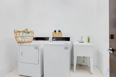 a kitchen with white appliances and a sink at Hollywood Bliss - Near Beach Studio - Rooftop Pool in Hollywood