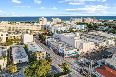 an aerial view of a city with buildings and the ocean at Charming Large Studio Near Ocean Dr - South Beach in Miami Beach