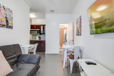 a living room with a couch and a table at Comfy 1 B/R, Near Ocean Dr & Beach - South Beach in Miami Beach