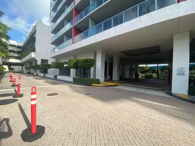 a building with red and white cones in front of it at 2 Full Beds, Modern Vibes, Coastal Location in Hallandale Beach