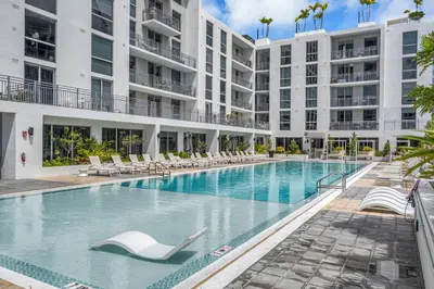 an image of a swimming pool at a hotel at Charming 3-Bed Mins from Brickell With Free Parking in Miami
