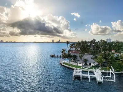 a resort on the water with a dock at Villa Hashmi Luxury 5BD & 5BA Retreat on North Bay Island in Miami Beach