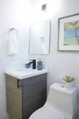 a bathroom with a sink and a toilet at Apt 3 Miami Designer Apartment in the Upper East-Side in Miami