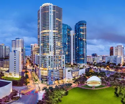 a city skyline with tall buildings and a park at Rio Vista Prestige on Las Olas Heated Pool in Fort Lauderdale