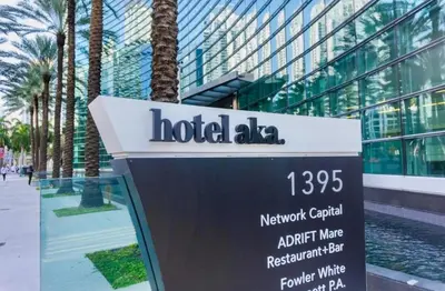 a sign in front of a building with a hotel alabama at Brickell 31th Floor Sea View Free Parking by Palermo Home Miami in Miami