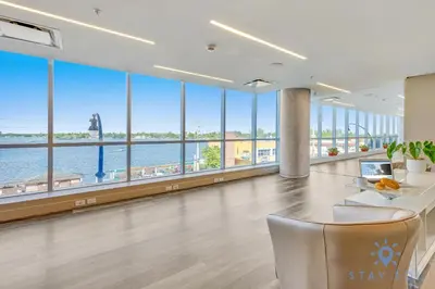 a large office with a view of the water at Hollywood Beach Rooftop Pool Balcony in Hollywood