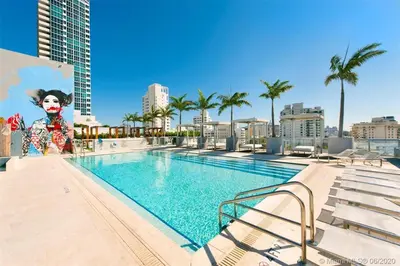 a large swimming pool with a mural of a clown at Hotel Miami Beach Convention Center in Miami Beach