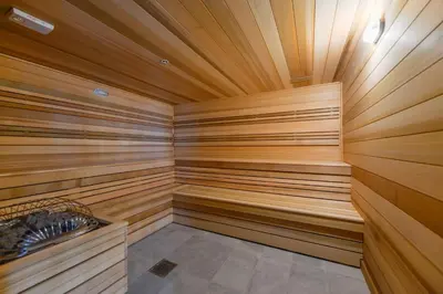 a sauna with wooden paneled walls and a wooden ceiling at Prime location: Luxury Condo at brickell in Miami