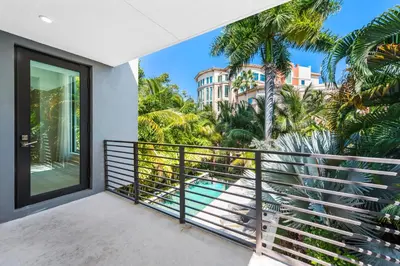 a balcony with a view of a building at Villa Celine in Fort Lauderdale