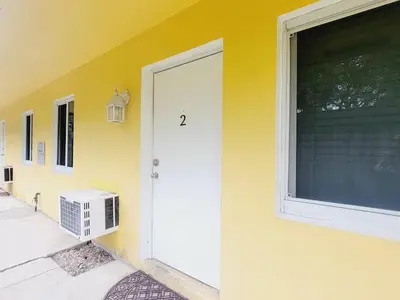 a door of a house with a window at Arpe 4plex in Fort Lauderdale