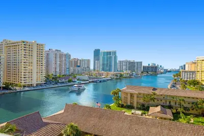 a view of a river in a city with buildings at Amazing Pool Apartment with Balcony Near Beach in Hallandale Beach