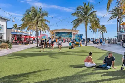 a group of people sitting on the grass in a park at Young Circle & Hollywood Blvd Posh Studio Suite in Hollywood