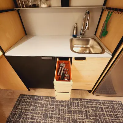 a small kitchen with a sink and a counter at Private Home Studio Central Located in Miami 1 in Opa-locka