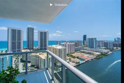 a view of the ocean from a balcony of a city at Apartment 3B/3B Stunning view of the intercostal in Hallandale Beach