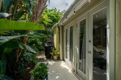 a porch of a house with plants and a door at Family Home 2BR Heated Pool, Victoria Park in Fort Lauderdale