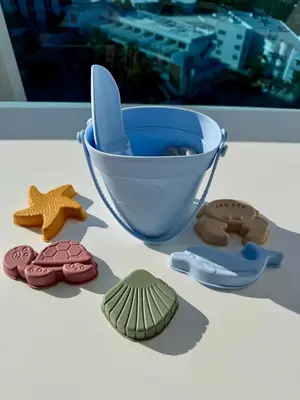 a table with a blue bowl and cookies on it at Oceanview 1 Hotel & Homes 1 Bedroom 1 and Half Bathrooms Luxe Condo with Balcony in Miami Beach