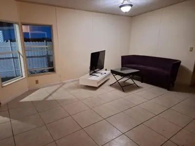 a living room with a couch and a table at 1233 Apartment 1 Miami in Tamiami