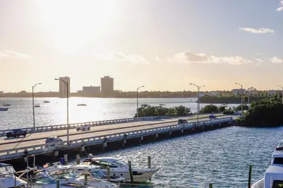 a bridge over a river with boats in the water at Bayshore Bliss, Cozy with Water Views of Miami Bay in Miami Beach