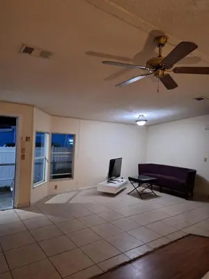 a living room with a ceiling fan and a couch at 1233 Apartment 2 Miami in Tamiami