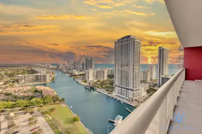 a view of a river in a city with tall buildings at Breathtaking 31st Fl Beachwalk Penthouse View in Hallandale Beach