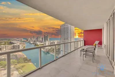 a balcony with a view of the city at Breathtaking 31st Fl Beachwalk Penthouse View in Hallandale Beach
