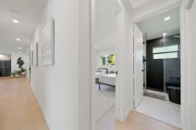 a hallway of a house with a bathroom and a bedroom at New Luxury Villa Delilah Biscayne Park in Biscayne Park