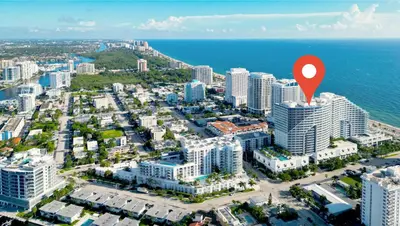 an aerial view of a city with a red marker on it at Nautica - Ocean View & Rooftop Pools! by Newman Hospitality in Fort Lauderdale