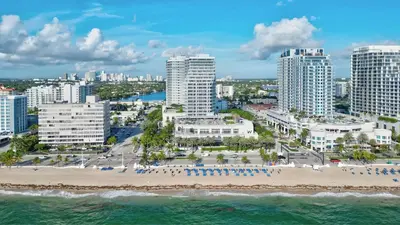 an aerial view of a beach and buildings at Nautica - Ocean View & Rooftop Pools! by Newman Hospitality in Fort Lauderdale