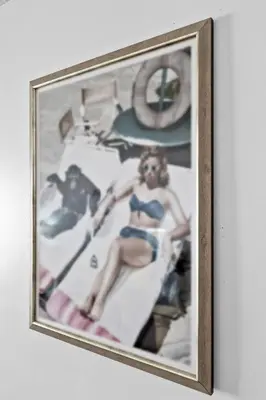 a framed picture of a woman on a beach at Amazing 1 Bed in Brickell key With FREE PKG in Miami