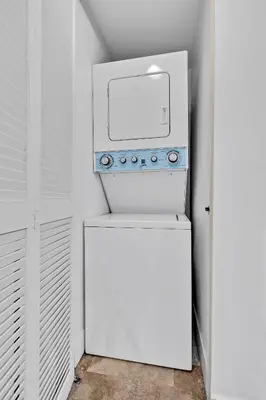 a white refrigerator in a white room at Amazing 1 Bed in Brickell key With FREE PKG in Miami