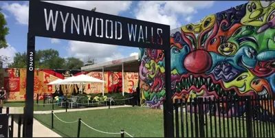 a sign in front of a wyrnd world walk at Modern apartment in Edgewater in Miami