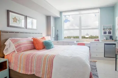 a bedroom with a bed and a large window at Coconut Grove 10th Floor private unit Parking Included in Miami